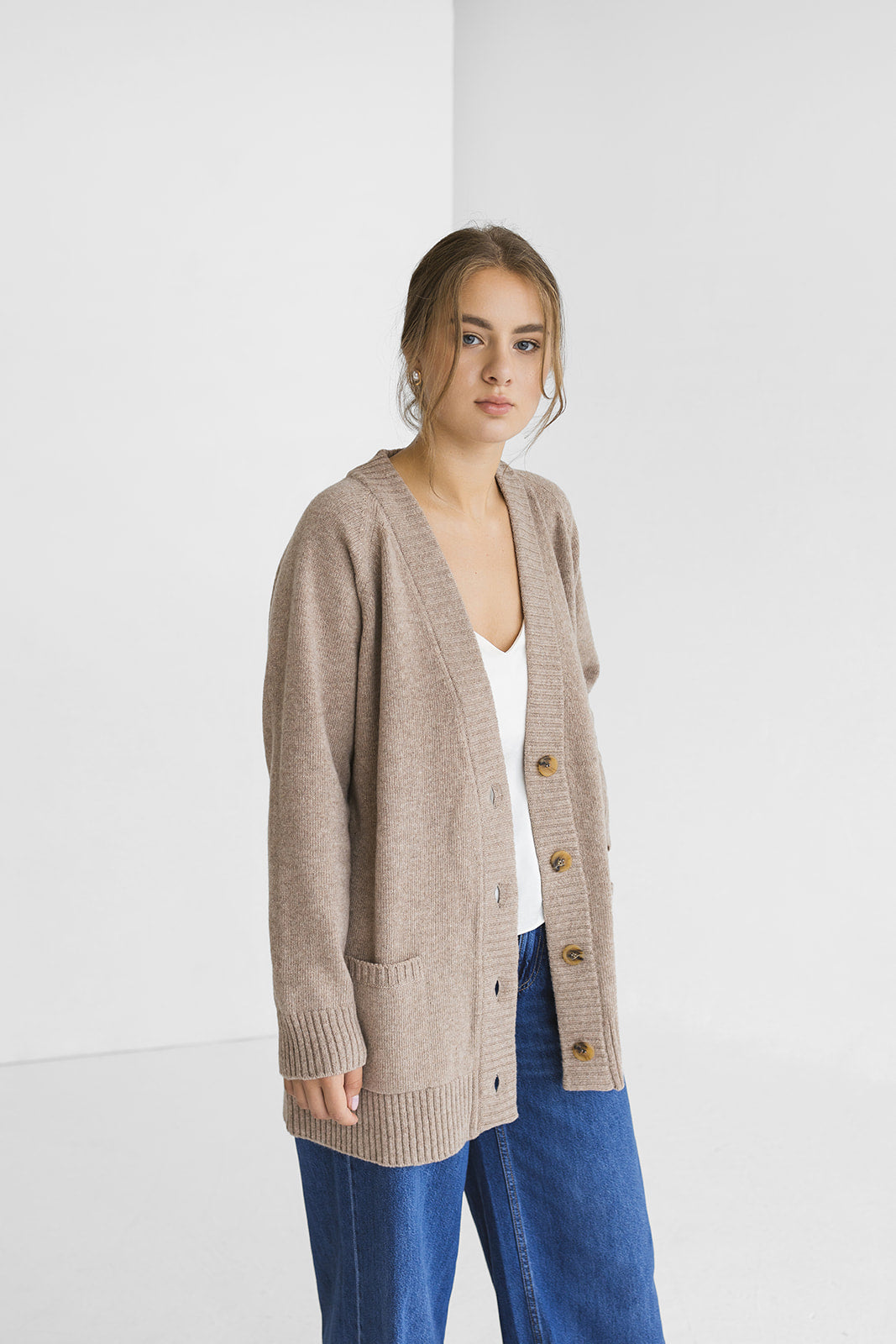 Beige knitted merino wool and cashmere blend cardigan with pockets and buttons, slightly oversized taupe knit sweater for women, camel gilet