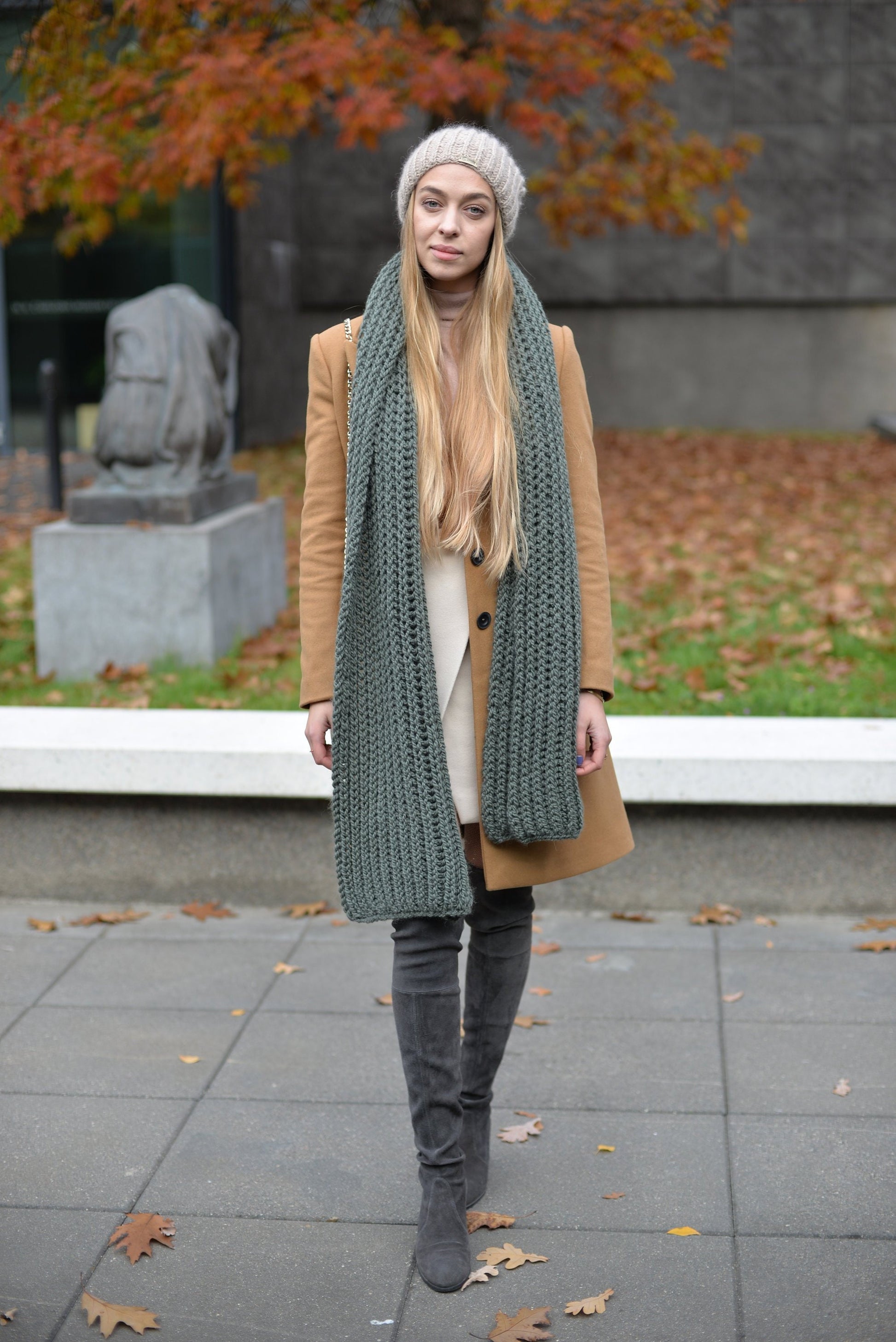 Green knit scarf. This chunky knit wool and alpaca scarf will keep you warm and cosy.