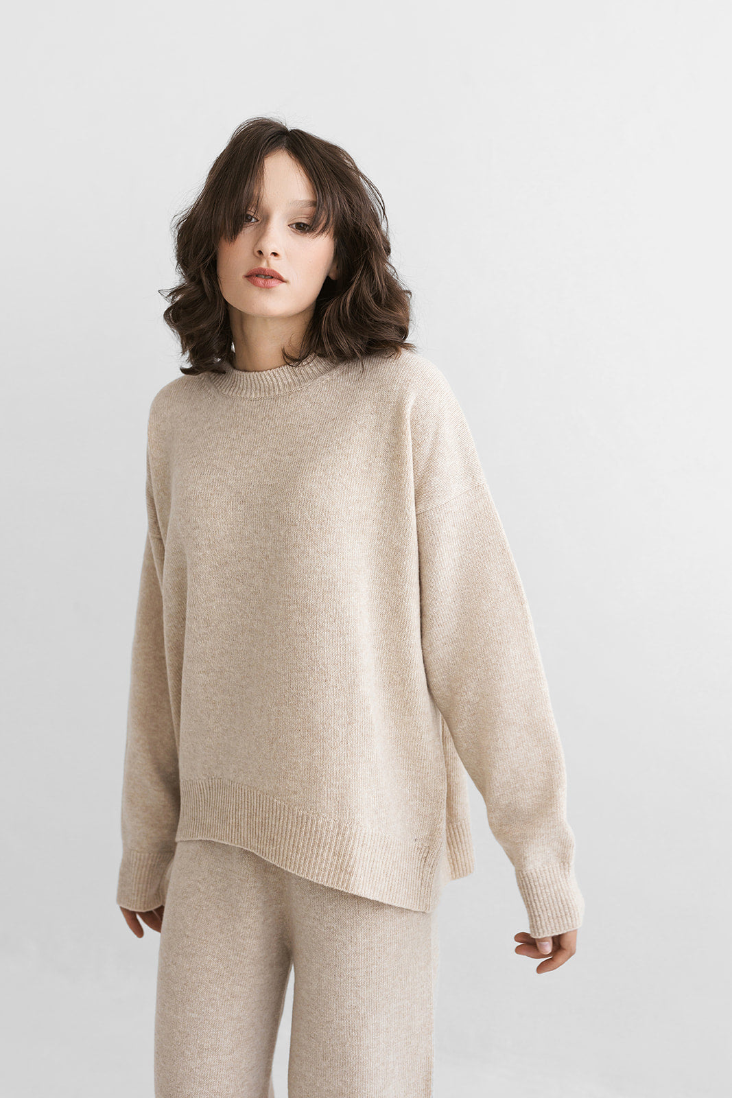 Beige knitted merino wool sweater for women, taupe women's knit minimalist pullover with longer back, camel minimal jumper, pastel fall pull