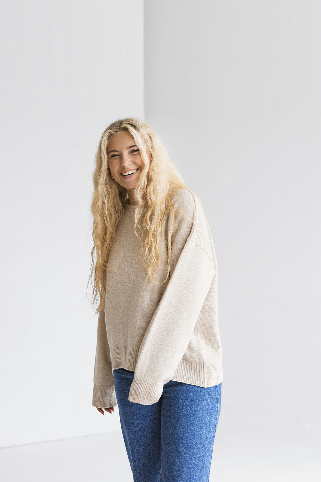 Beige knitted merino wool sweater for women, taupe women's knit minimalist pullover with longer back, camel minimal jumper, pastel fall pull