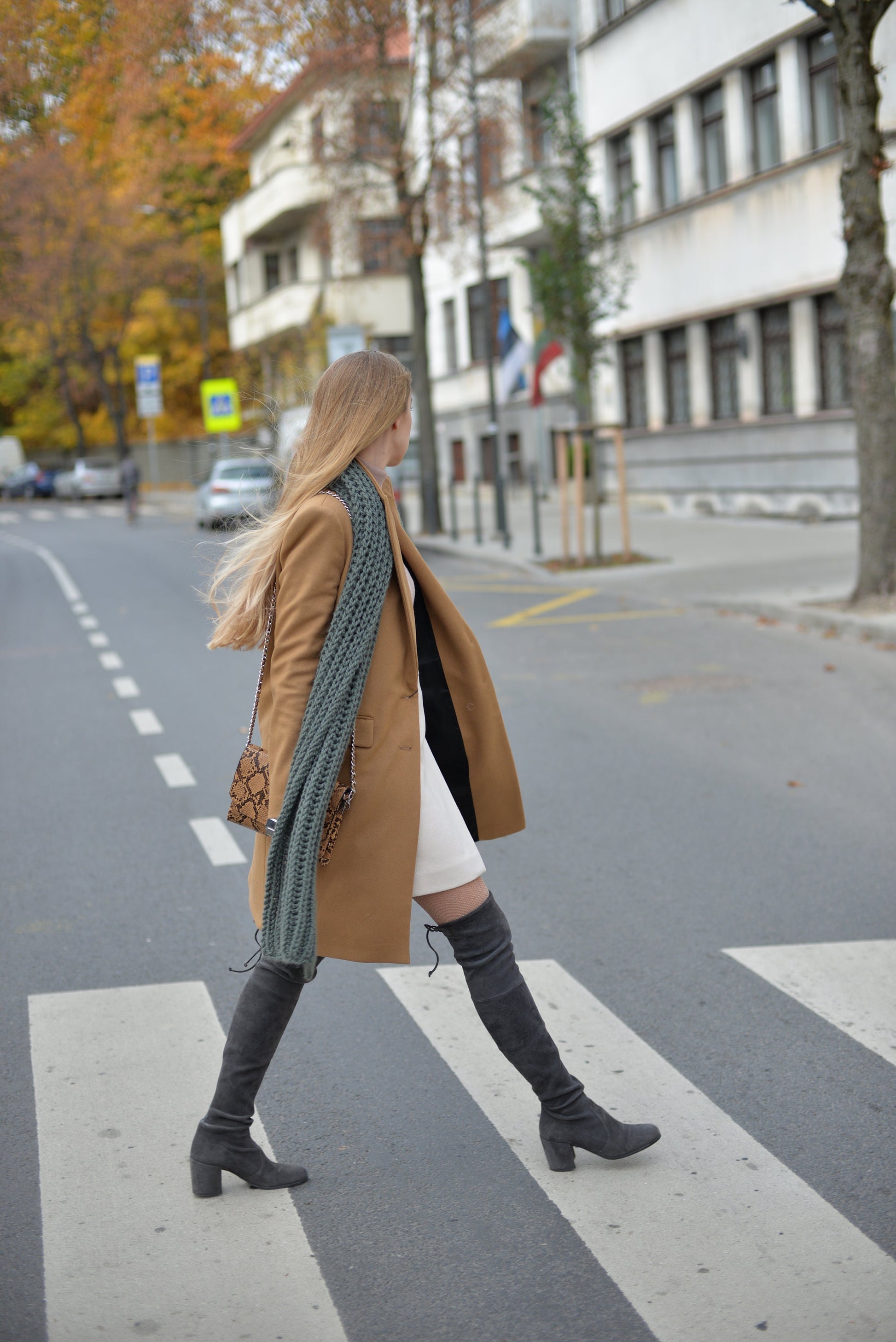 Green knit scarf. This chunky knit wool and alpaca scarf will keep you warm and cosy.