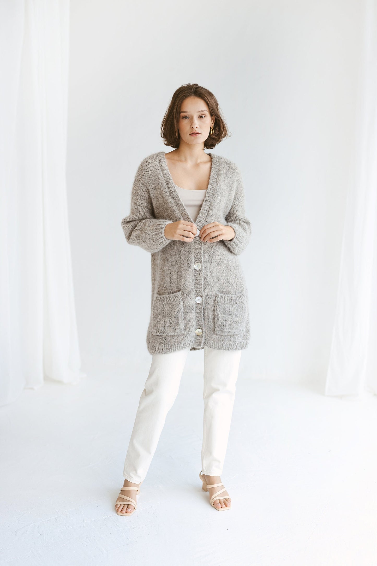 Grey Alpaca Cardigan With Pockets, Light Grey Relaxed Cable Knit Buttoned Cardigan, Light Gray Chunky Knit Alpaca Wool Sweater With Buttons