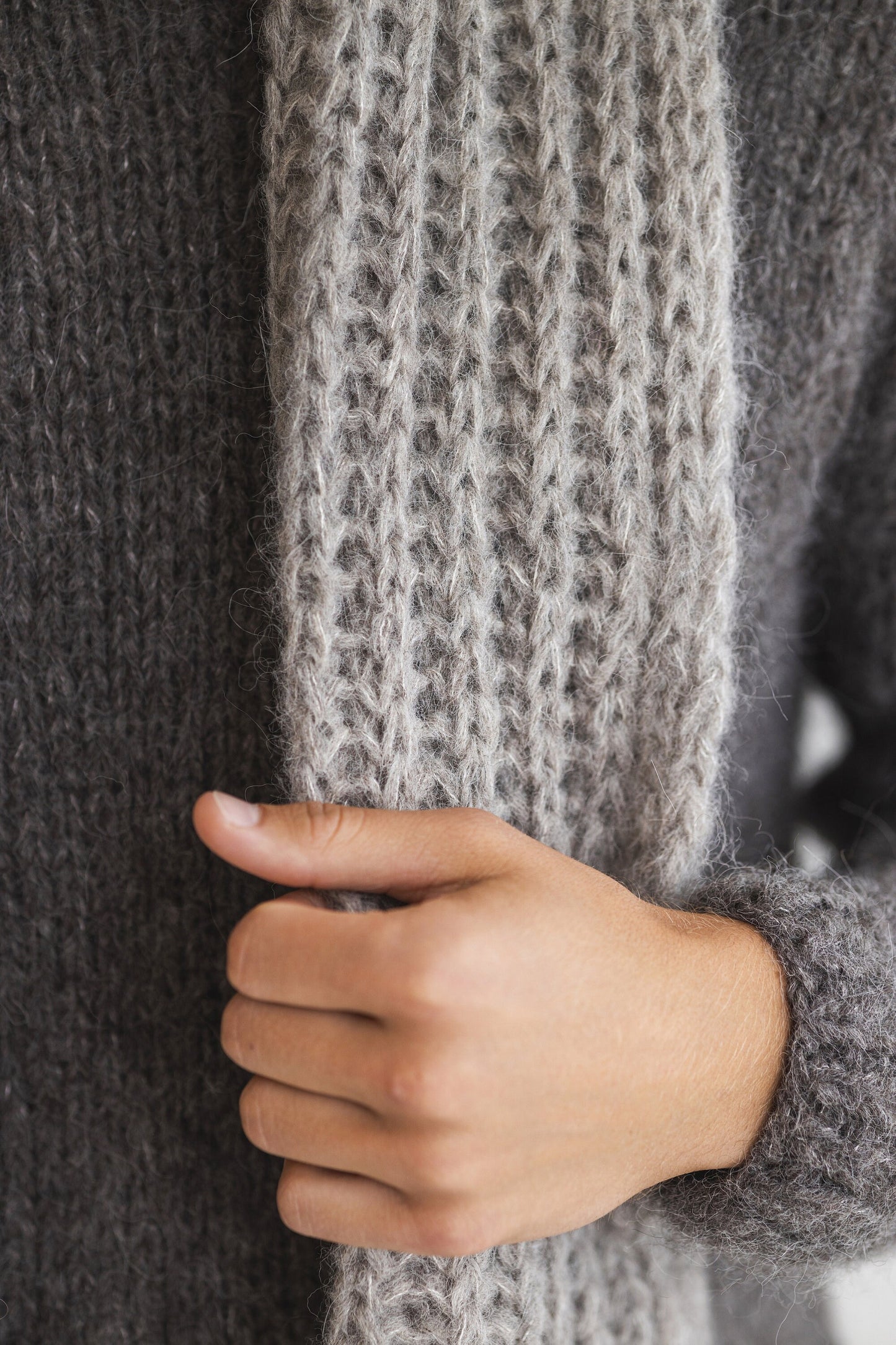 Gray knitted alpaca scarf