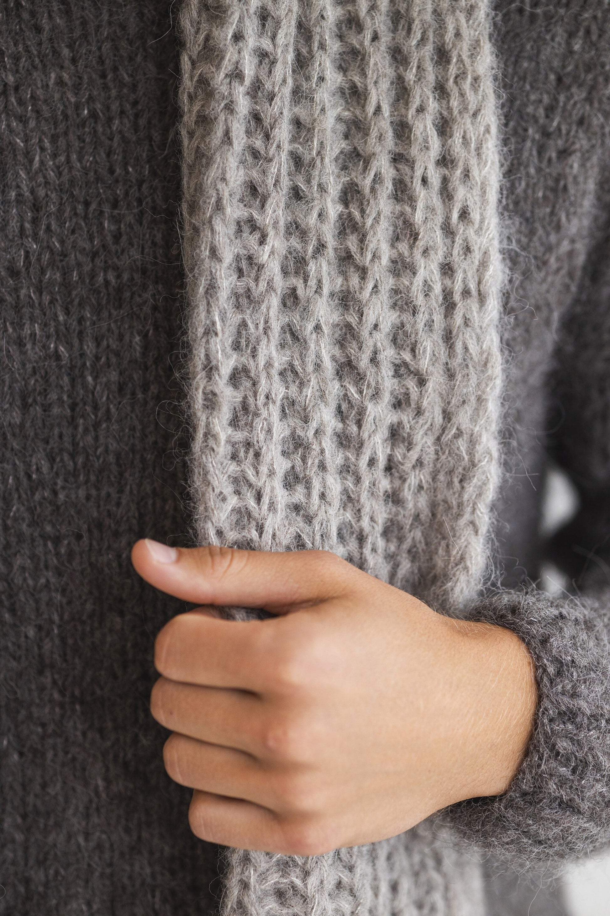 Gray knitted alpaca scarf