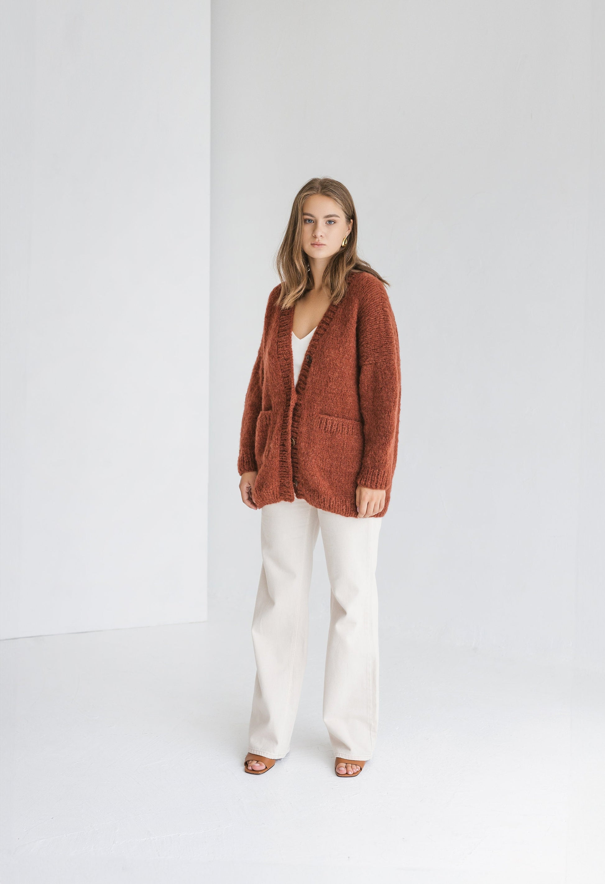 Rust cable knit alpaca wool cardigan with buttons, orange slightly oversized buttoned woolen sweater with pockets, ginger chunky knitted