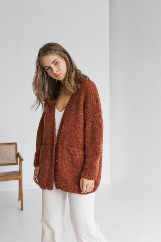 Rust cable knit alpaca wool cardigan with buttons, orange slightly oversized buttoned woolen sweater with pockets, ginger chunky knitted