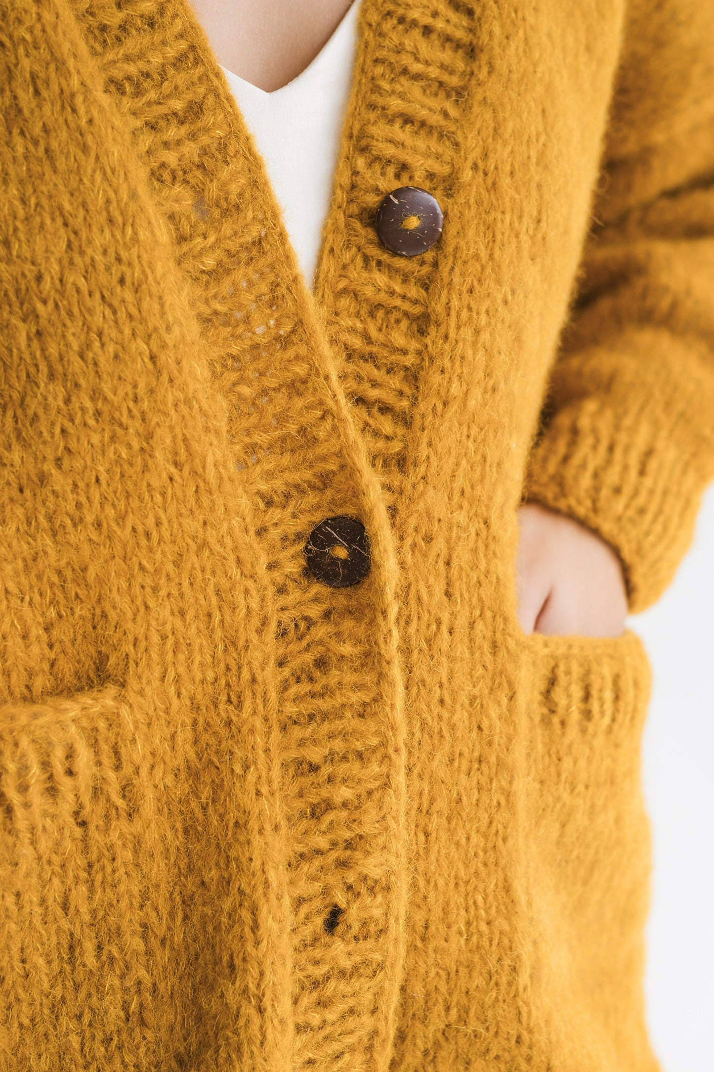 Yellow cable knit alpaca wool cardigan with buttons, curry slightly oversized buttoned woolen sweater with pockets, mustard chunky knitted