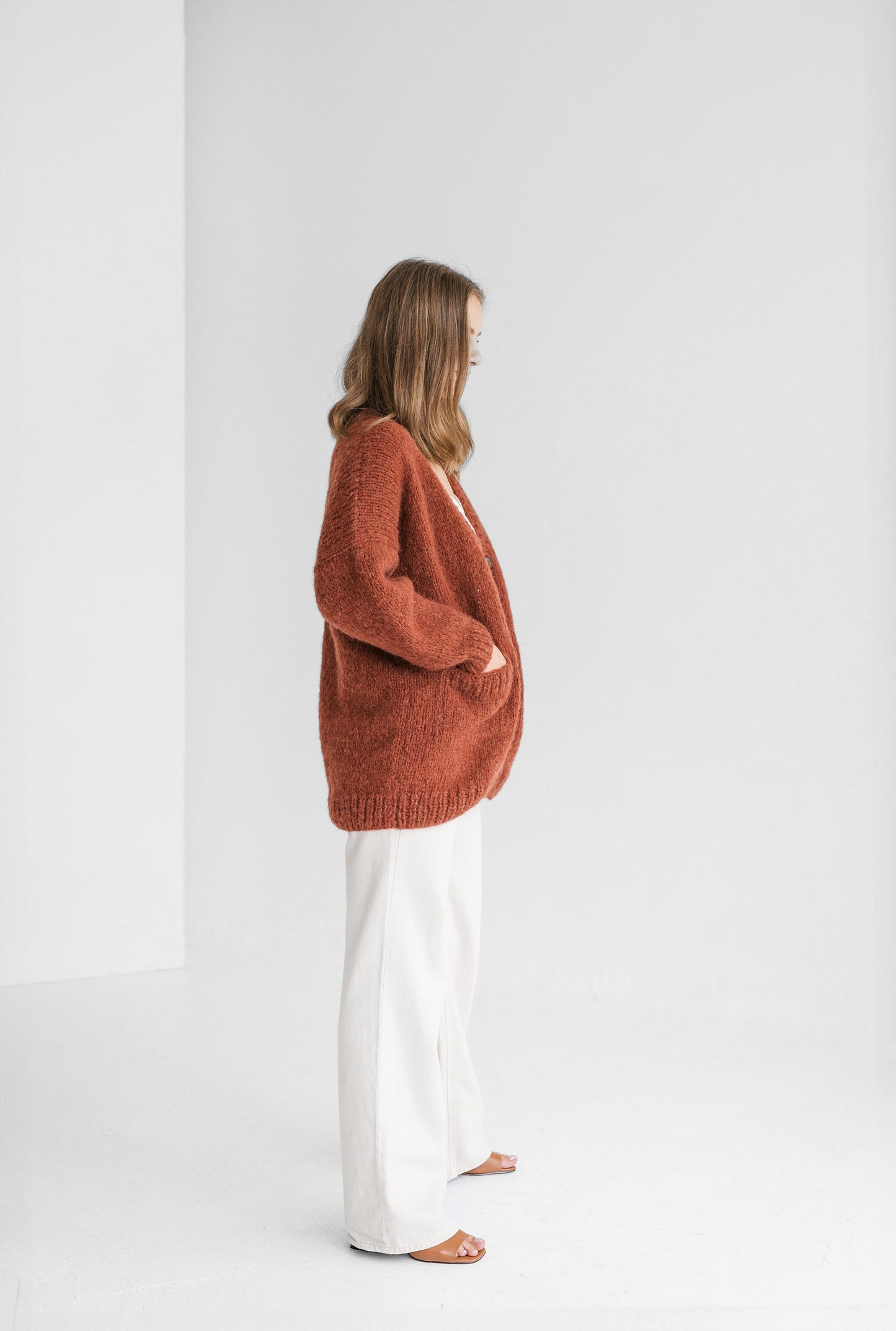 Rust cable knit alpaca wool cardigan with buttons, orange slightly oversized buttoned woolen sweater with pockets, ginger chunky knitted