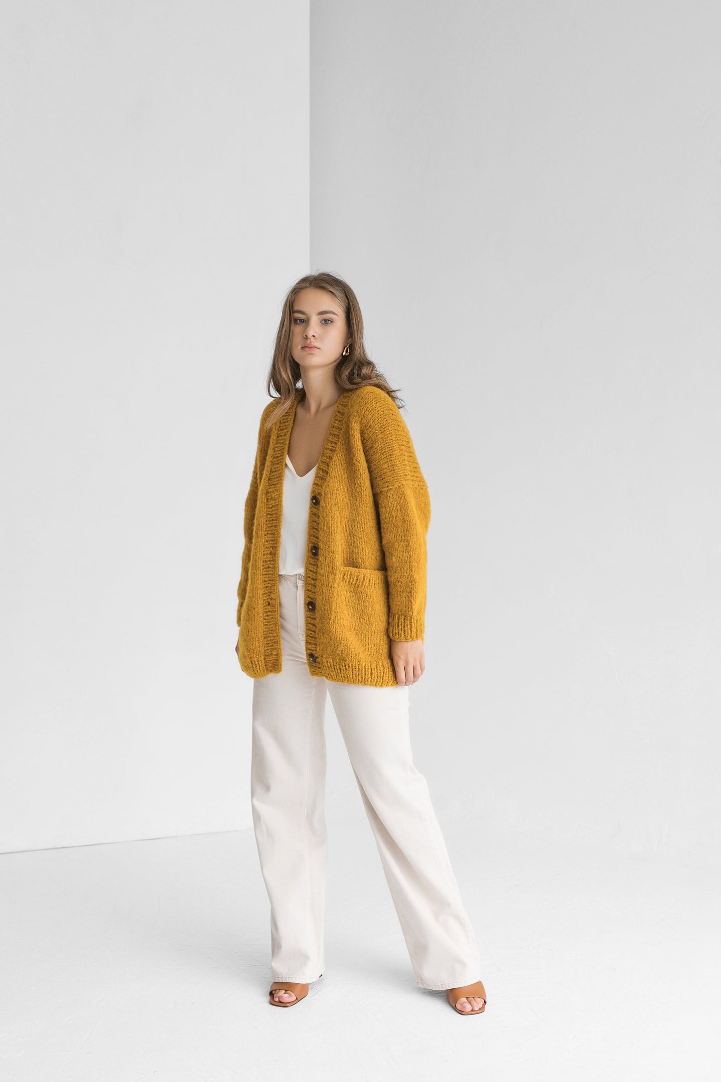 Yellow cable knit alpaca wool cardigan with buttons, curry slightly oversized buttoned woolen sweater with pockets, mustard chunky knitted