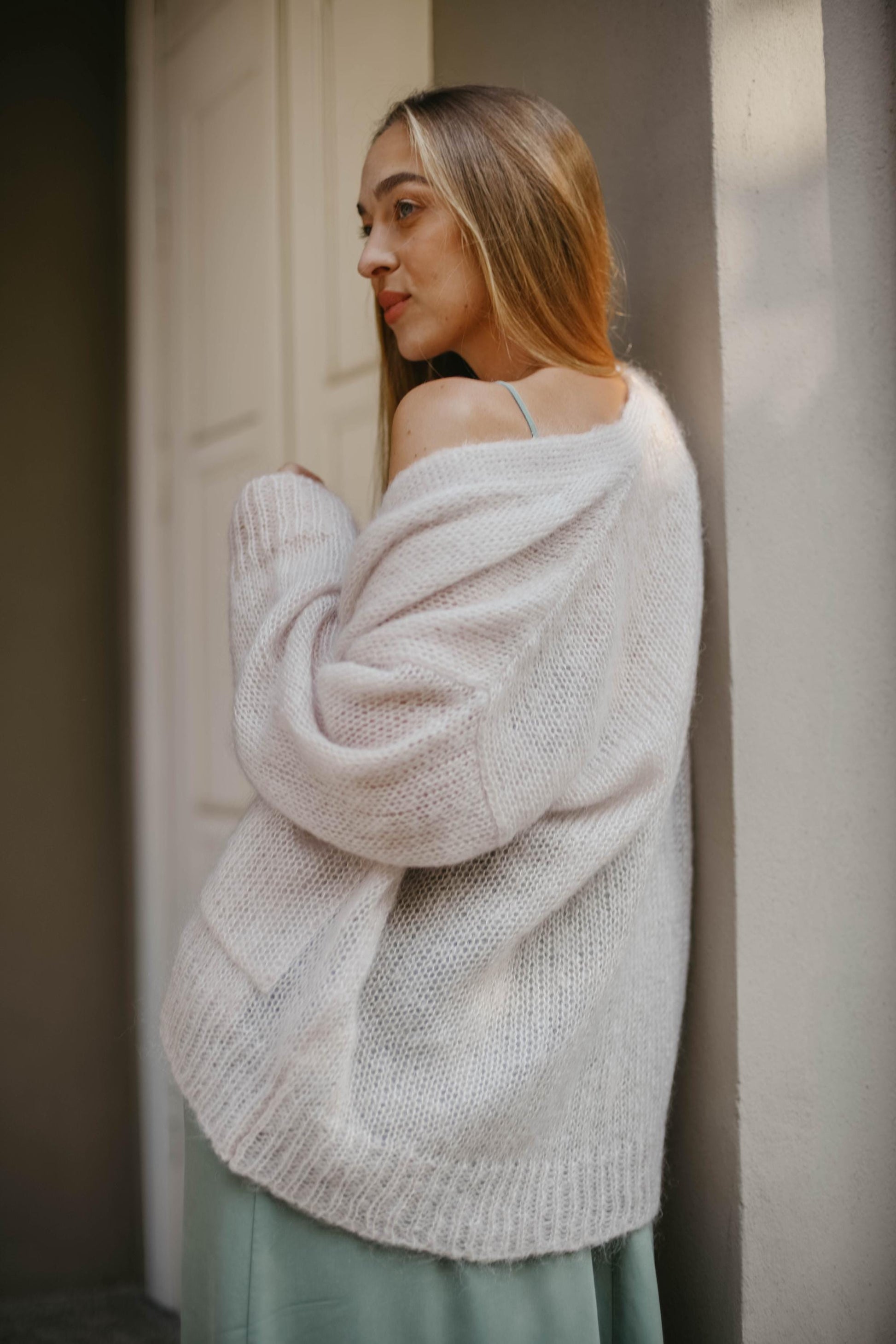 Green fluffy mohair cardigan with buttons and pockets
