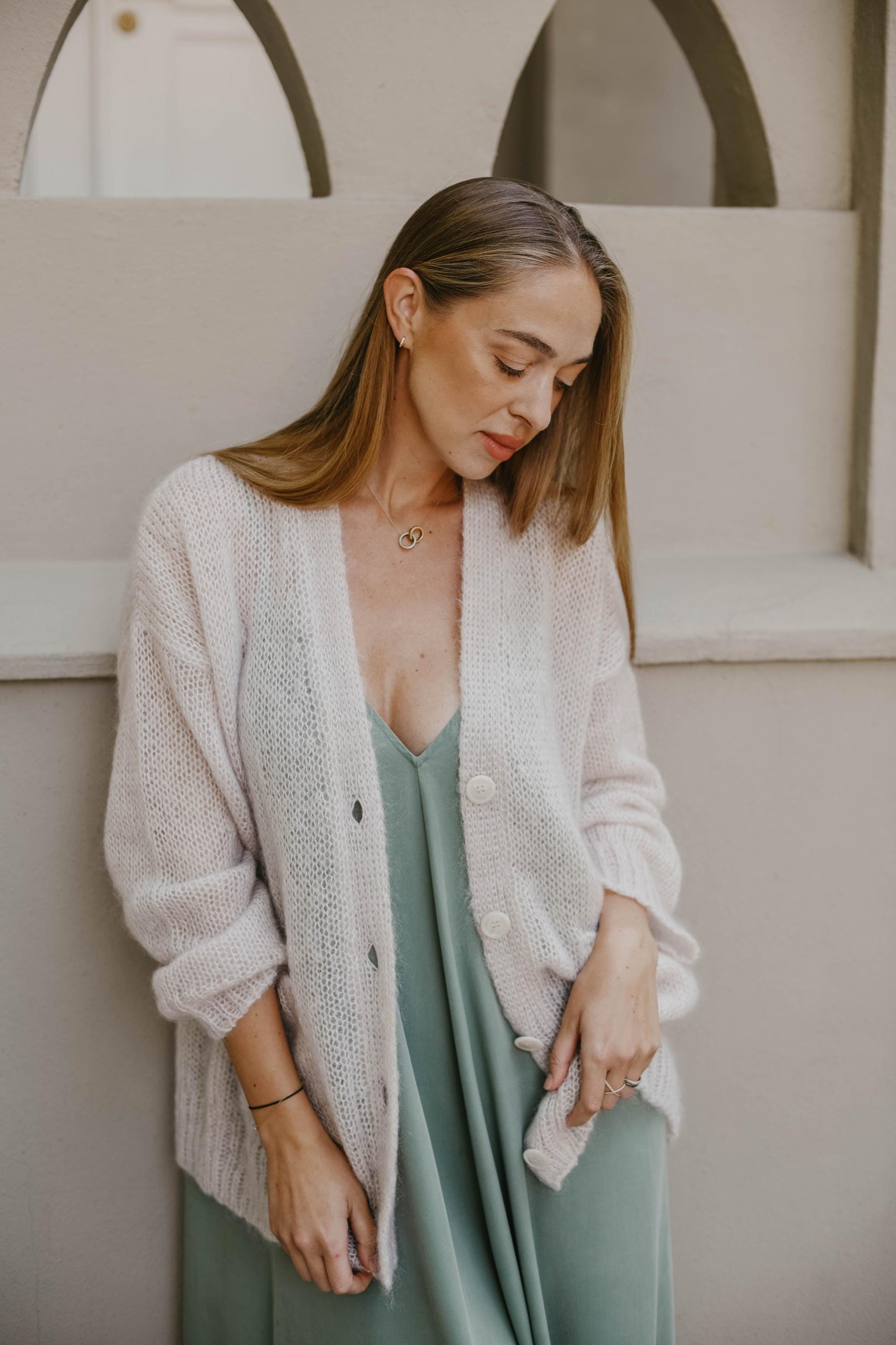 Green fluffy mohair cardigan with buttons and pockets