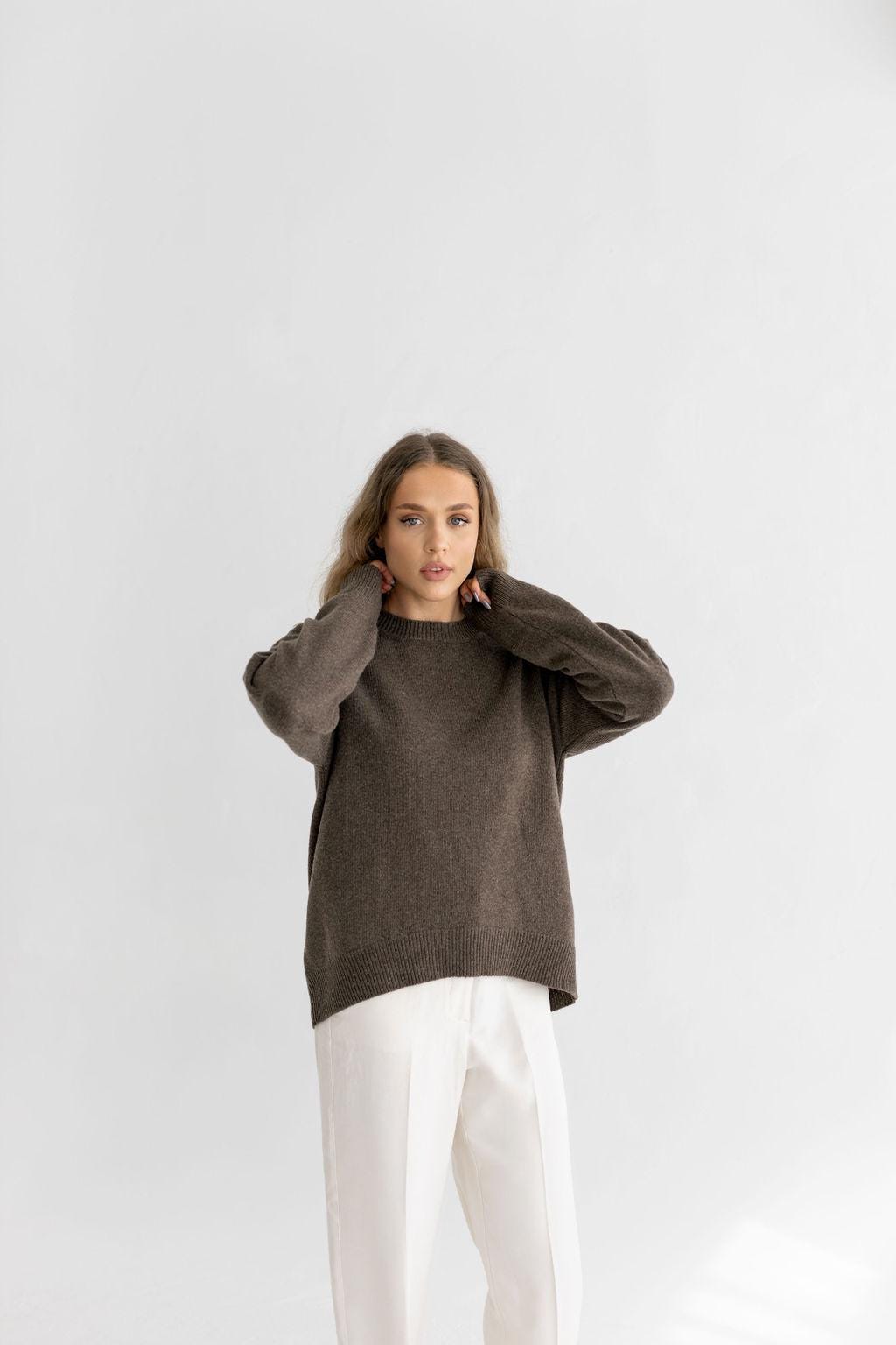 Gray knitted merino wool sweater for women, bright grey women's knit minimalist pullover with longer back, light gray jumper