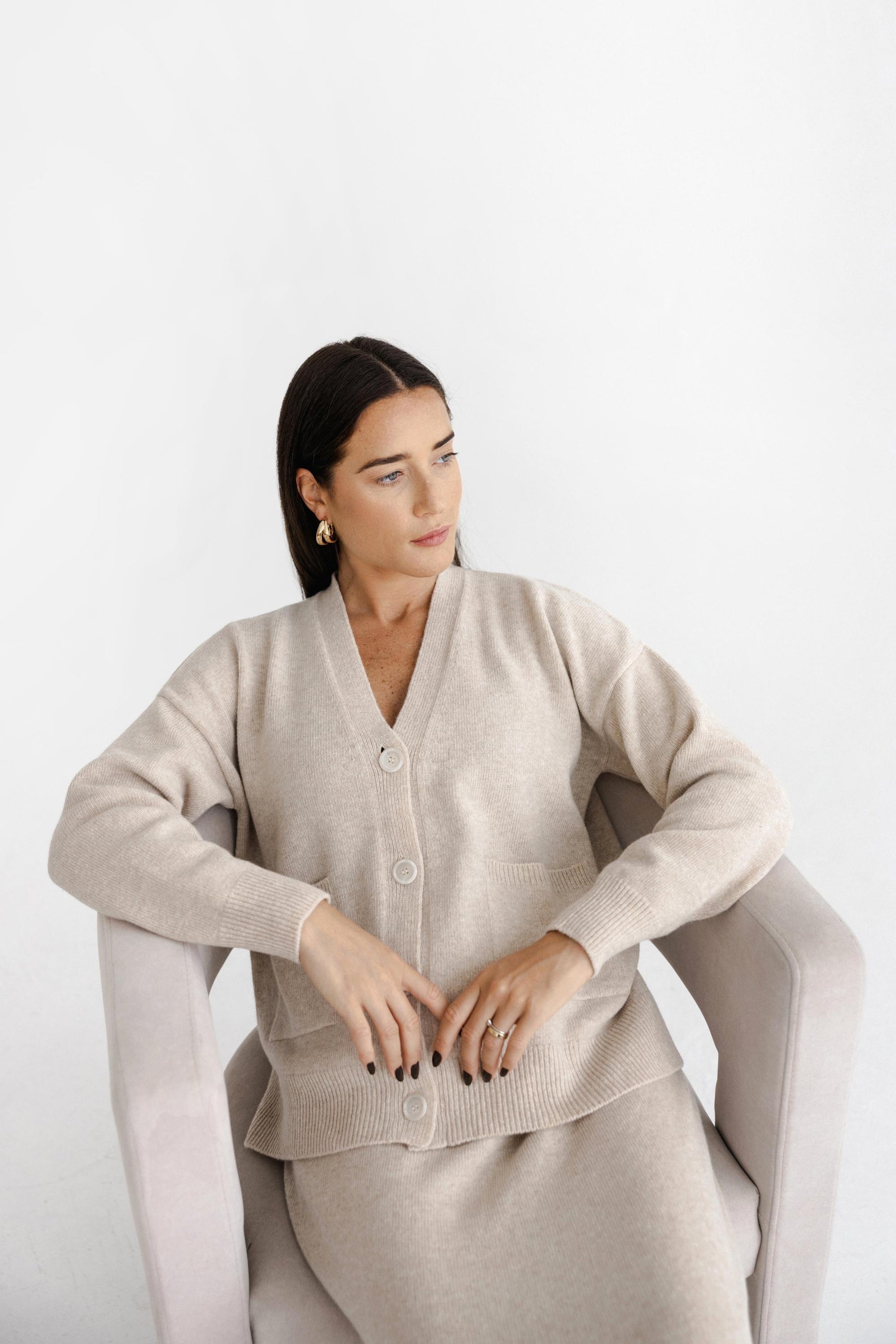 Beige Knitted Merino Wool Bottoned Cardigan With Pockets And Long Pensil Skirt Set For Women