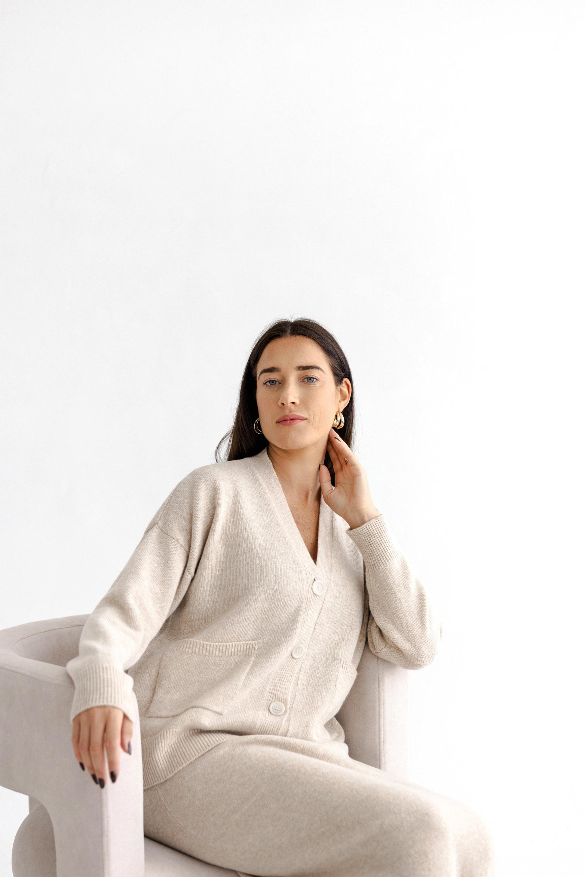 Beige Knitted Merino Wool Bottoned Cardigan With Pockets And Long Pensil Skirt Set For Women