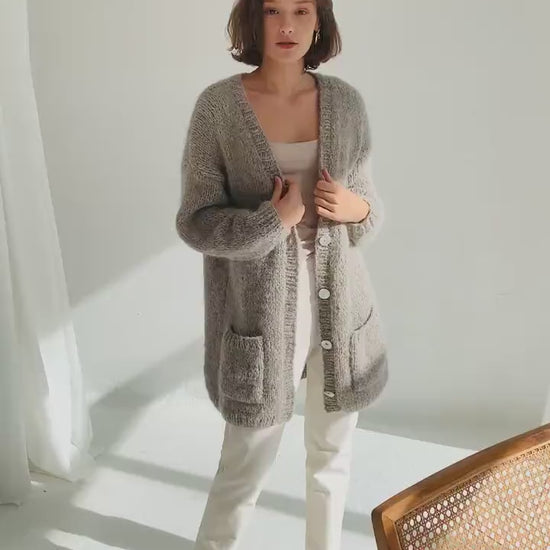 Grey Alpaca Cardigan With Pockets, Light Grey Relaxed Cable Knit Buttoned Cardigan, Light Gray Chunky Knit Alpaca Wool Sweater With Buttons