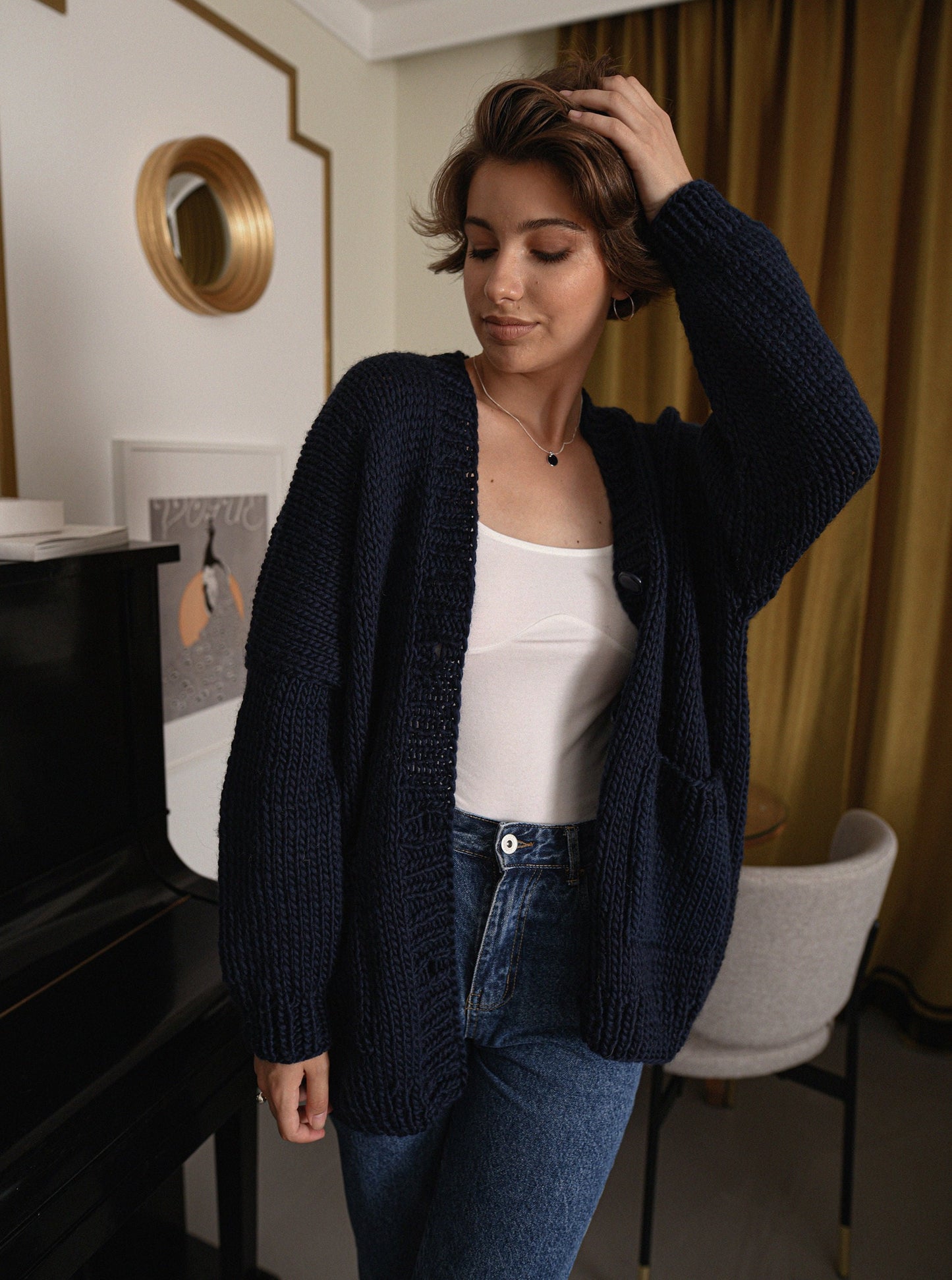 Bottoned wool cardigan with pockets